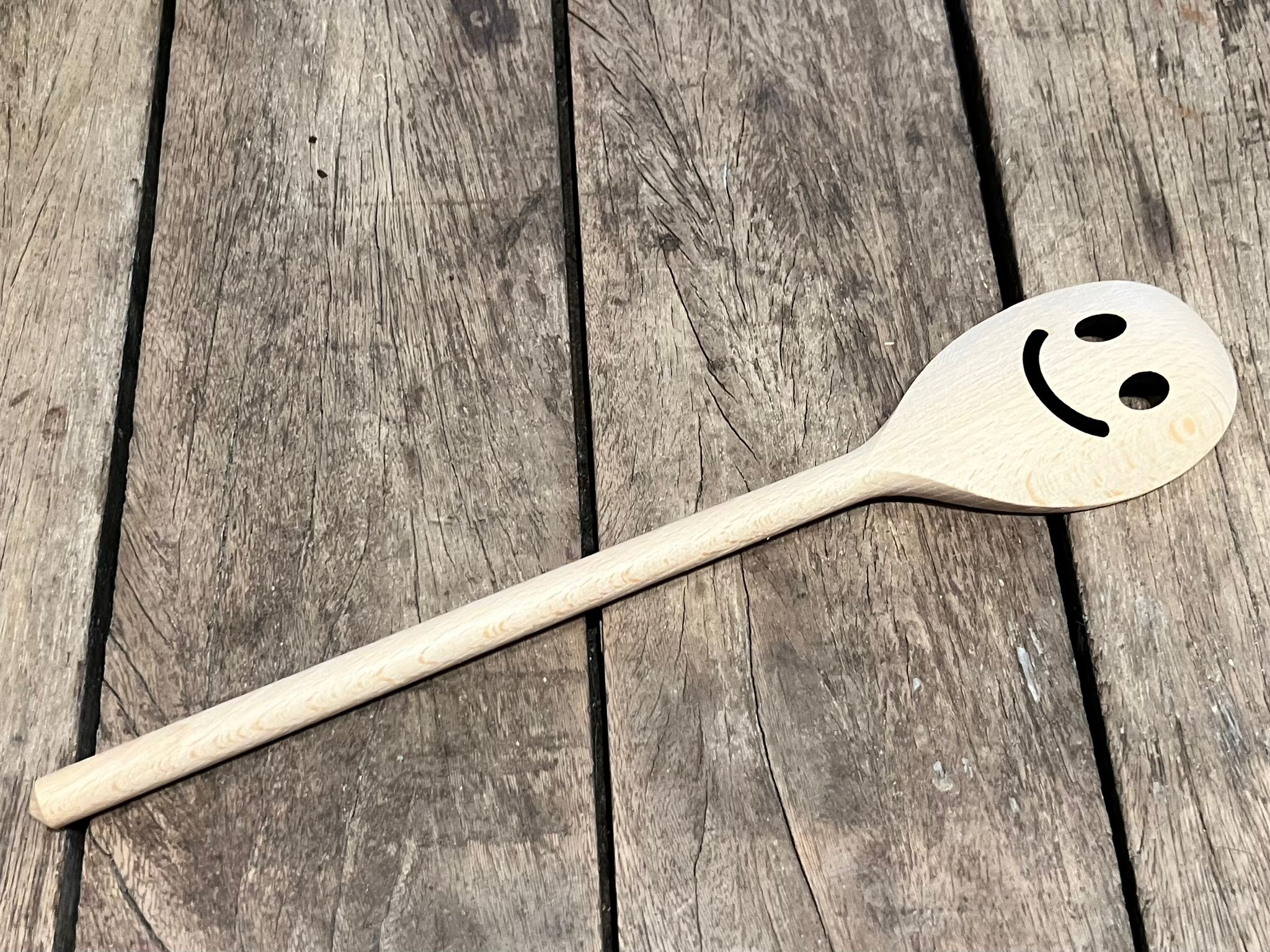 DOTTI Kooklepel met lachend gezichtje